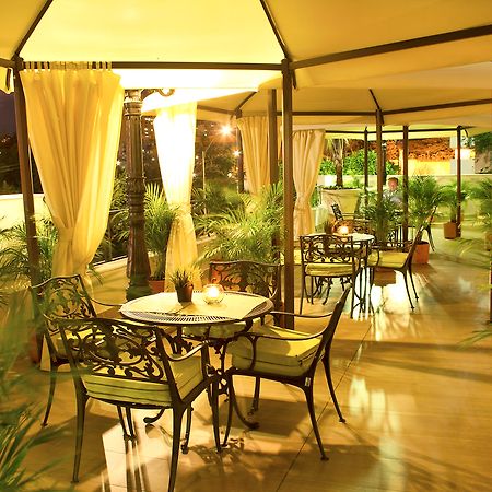 Hotel Cosmos كالي المظهر الخارجي الصورة
