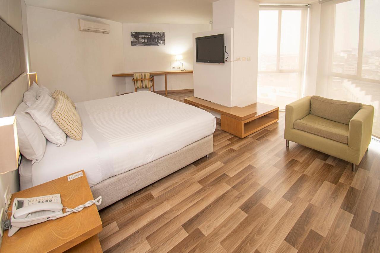 Hotel Cosmos كالي المظهر الخارجي الصورة