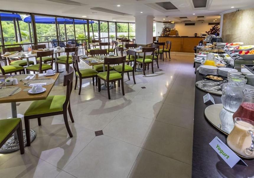 Hotel Cosmos كالي المظهر الخارجي الصورة