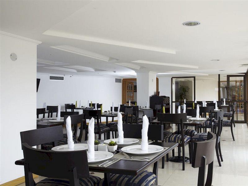 Hotel Cosmos كالي المظهر الخارجي الصورة