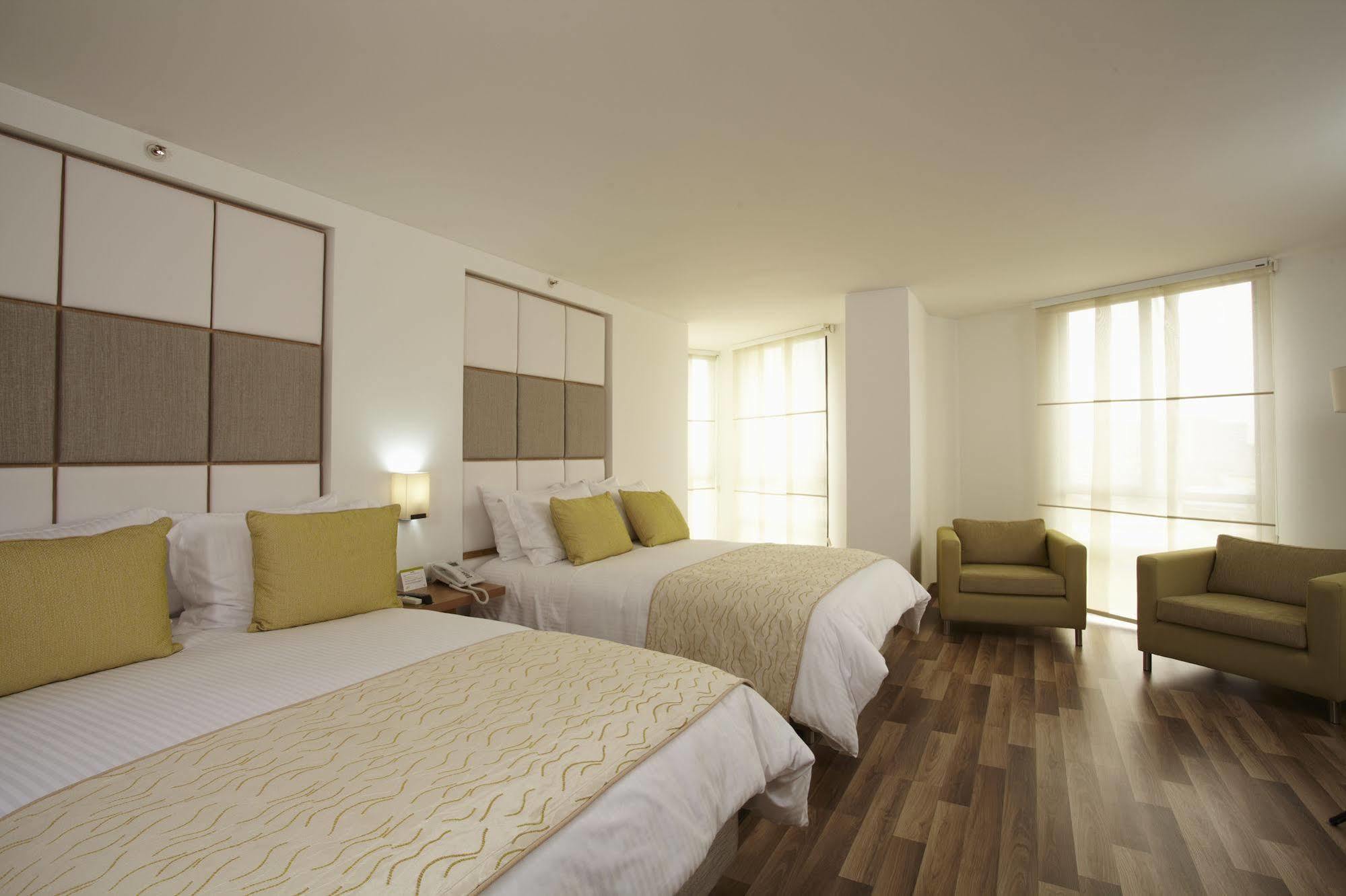Hotel Cosmos كالي المظهر الخارجي الصورة