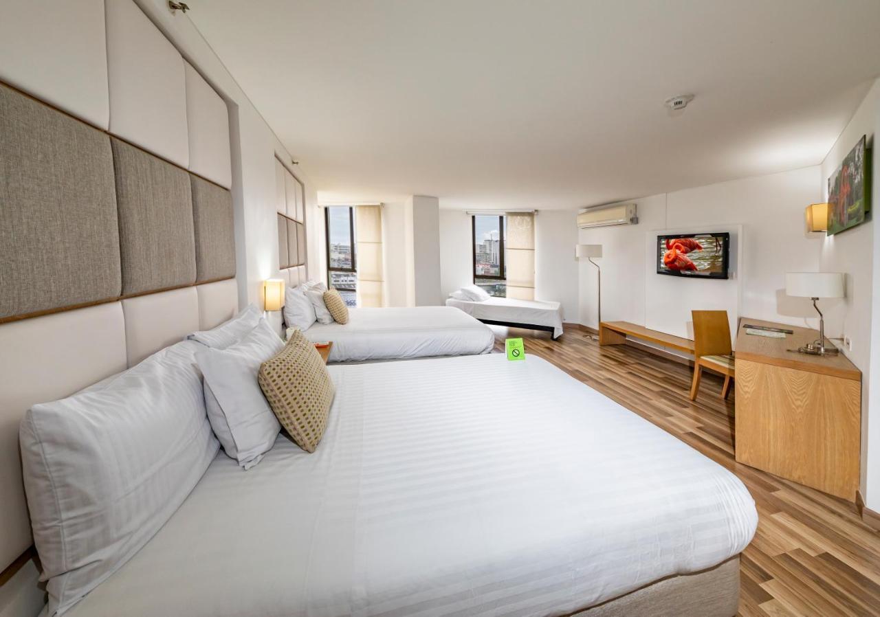 Hotel Cosmos كالي المظهر الخارجي الصورة