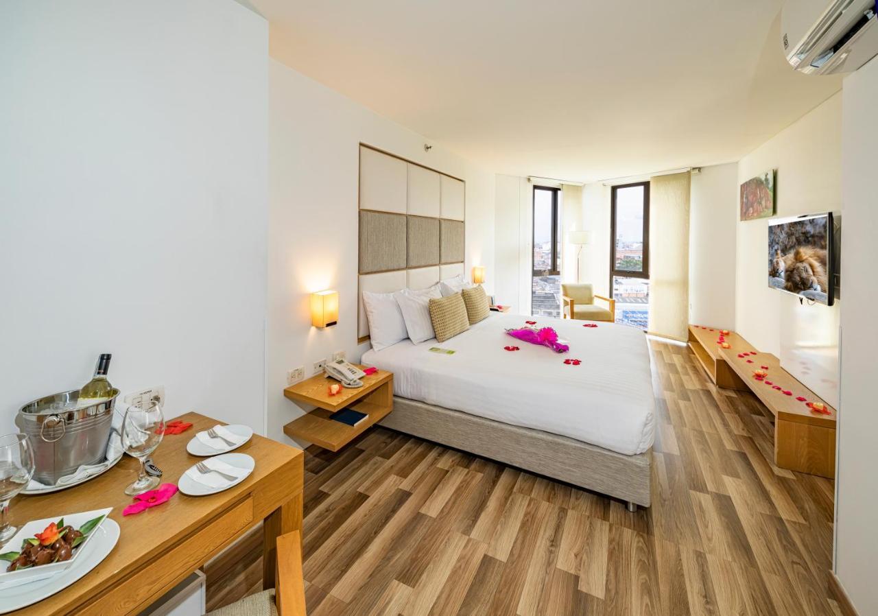 Hotel Cosmos كالي المظهر الخارجي الصورة